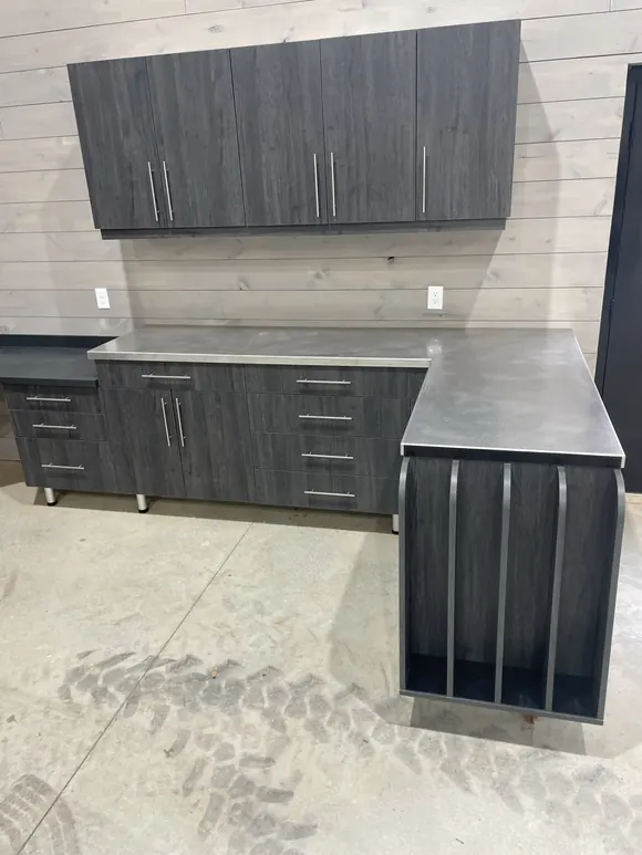 Custom Garage Cabinets Showing Countertop And End Details For Gun Storage