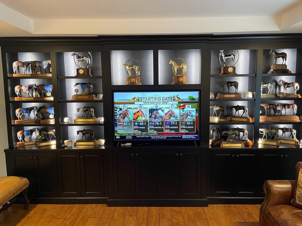 custom entertainment center horse award cabinetry